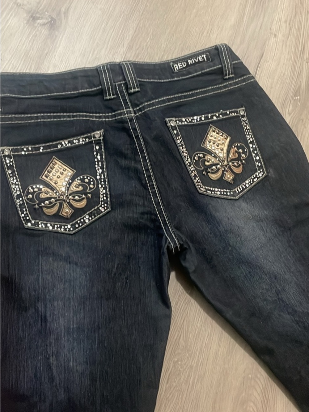 Red Rivet Women's dark blue Jeans with Fleur-de-Lis Pocket Embellishments